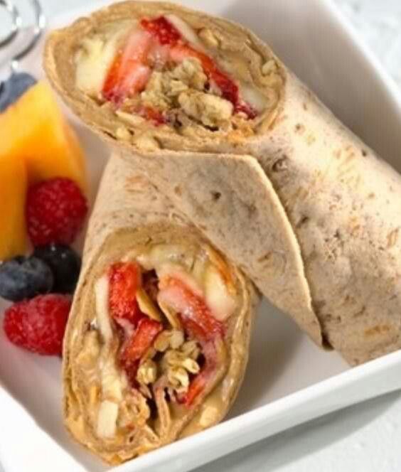 peanut butter, strawberries, bananas and granola = healthy breakfast to go. Yum..