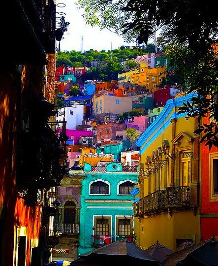 Guanajuato, Mexico. I love the architecture and color! I want to visit a place like this before I die.