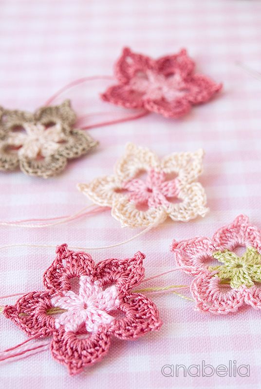 Five petals tiny crochet flower by Anabelia - tutorial to make these - only two rounds each