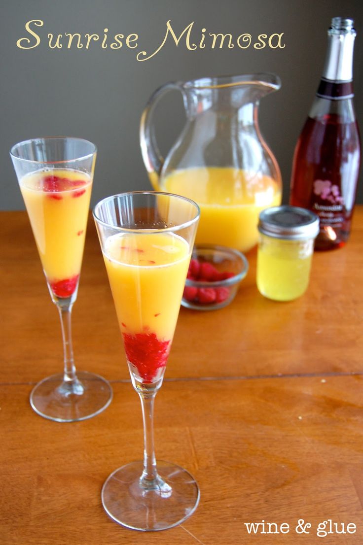 Sunrise Mimosa | Made with raspberries and orange simple syrup, this mimosa is sinfully delicious!
