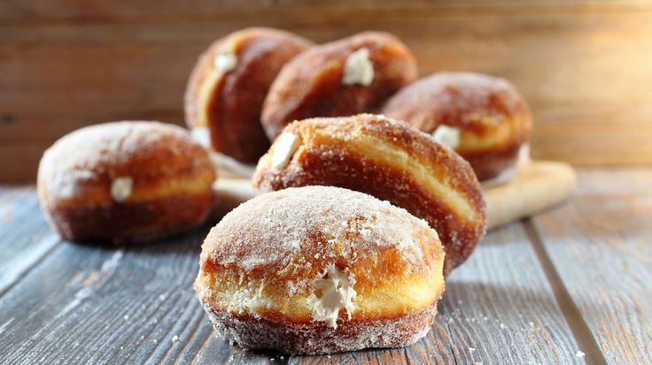 Stuffed sweets are doubly delicious. Making these cream-filled doughnuts is easier than you might think!