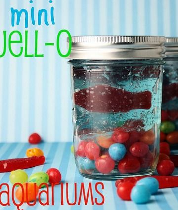 ini Jello Aquariums - These Jell-O and candy filled treats are so fun for parties!! Little ones love to see the candy fish "swimming" in the bowl. Inexpensive, simple, and impressive!!