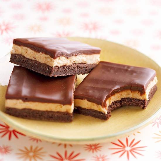 Honey-Roasted Peanut Butter Bars with Chocolate Ganache  With a rich layer of devil's food cake, a creamy peanut butter filling, and a fudgy topping, these easy bar cookies are a chocoholic's dream.