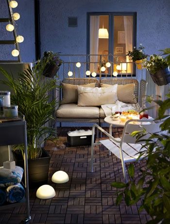 Wood decking that looks like parquet flooring is a perfect indoor/outdoor solution for a small patio. Decking by Ikea.
