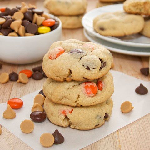 Soft peanut butter pudding cookies bursting with milk chocolate chips, peanut butter chips, and Reese's Pieces. Just describing these soft little cookies to you gets my mouth-watering! I have sever...