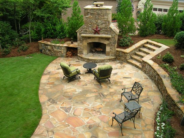 Private Play Space Whether it's for roasting marshmallows with the kids or grown-up entertaining, the fireplace often becomes the outdoor gathering spot for this family. Designed by landscape architect Mark Schisler.