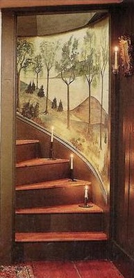 Got country style down to a fine art...Primitive painted wall mural of rolling country hills and trees accompanies a winding timber staircase painted in antique red...