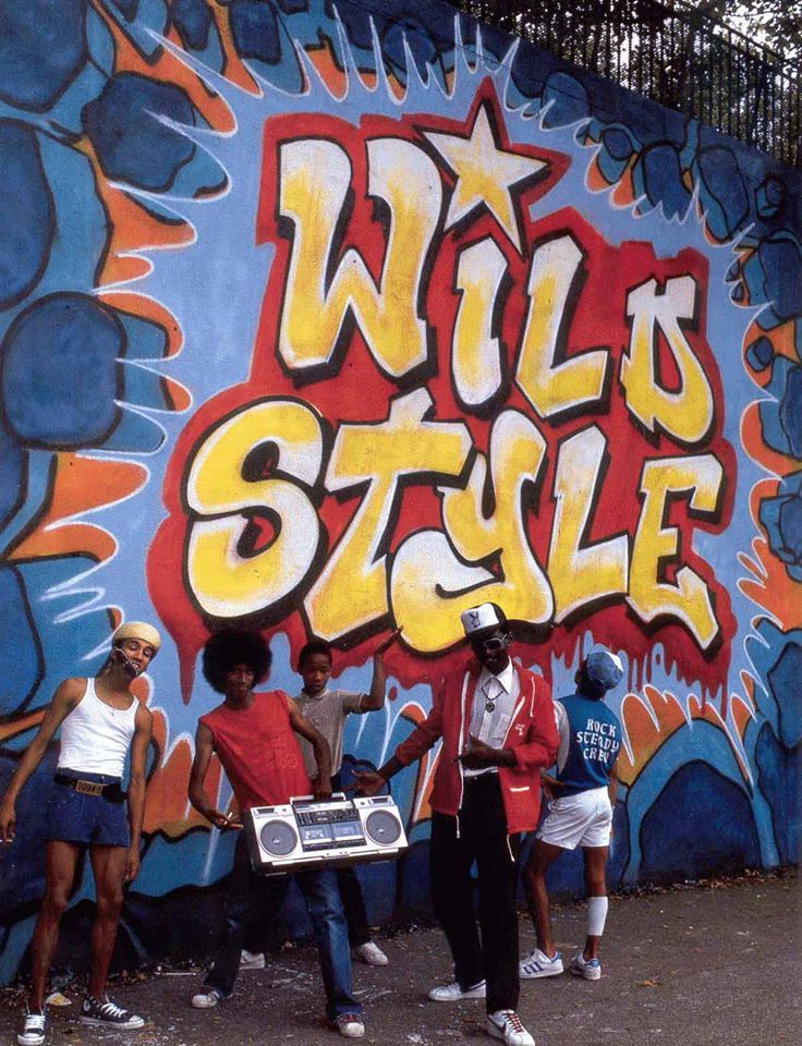 Rock Steady Crew in front of Wild Style by Zephyr and Revolt (Manhattan), 1983.
