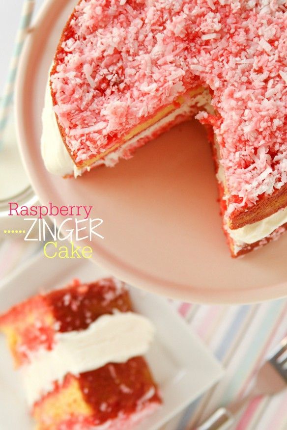 Raspberry Zinger Cake recipe. If you love the popular snack cake, you’ll love this Raspberry Zinger Cake!! Sturdy yellow sponge cake is coated in raspberry and coconut and filled with marshmallow frosting.