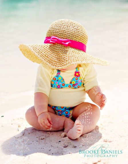 Oh my gosh. I've got to do this!! I have been looking for a newborn swimsuit, but HELLO they don't exist apparently. Since baby should stay covered up anyway, this will be PERFECT. How adorable.