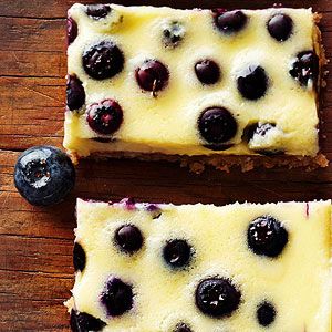 Coconut-Blueberry Cheesecake Bars An abundance of colorful blueberries dot this spectacular cheesecake dessert recipe.