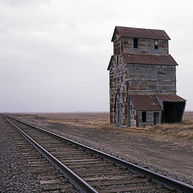 "Abandoned place along railroad tracks in Kansas"
