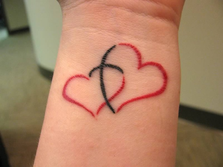 two hearts being joined together by a cross - keeping Christ the center of our relationship...