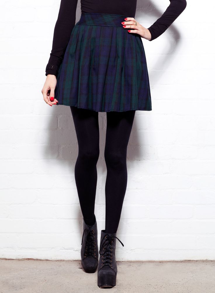 Shop Women's Green Tartan Lark High Waisted Skater Skirt. Buy retro & indie fashion at Phix Clothing.