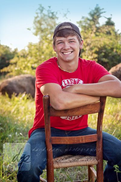 I could totally see a photo or two of our boys like this. They're more of the country-ish, rugged ones. :) Boy country senior