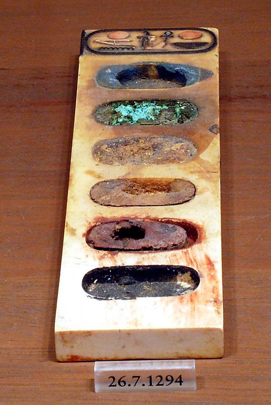 Painter's Palette (c.1390-1353 B.C.) ivory with pigment, inscribed with the name of Amenhotep III.