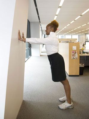 Squeeze in a 25-minute office workout. Try wall push-ups instead of the traditional floor kind.