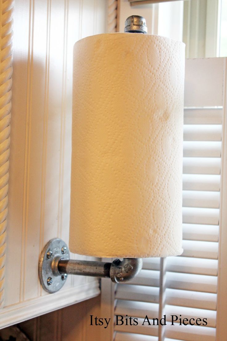 ndustrial Paper Towel Holder. 1/2" cir at a length of 12" pipe, a length of 4" pipe, a 90 degree elbow, a 3" plate, a cap