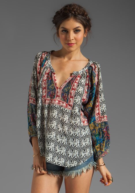 TOLANI Ruby Blouse in Elephants. I'd wear this with brightly coloured platform shoes and big dangly earrings.