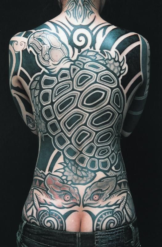 Love the Large turtle and chameleon, but would ask for intricate lines moving outward on this tribal blackwork.... ...and could do without the crack
