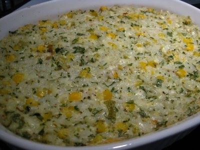 xican Sour Cream Rice-this is awesome! Great Mexican side dish! 1 cup uncooked long grain white rice 1 (14 ounce) can chicken broth 1 cup sour cream 1 (4 ounce) can diced green chile peppers 2 cups shredded pepper Jack cheese, divided 1 1/2 cups frozen co