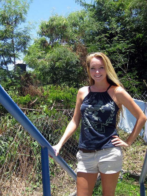 T-shirt turned into tanktop. This is easy-peasey to do and I get so many compliments on the shirts I've done this to. If you really want to get feminine, you could use a ribbon. LOVE IT!