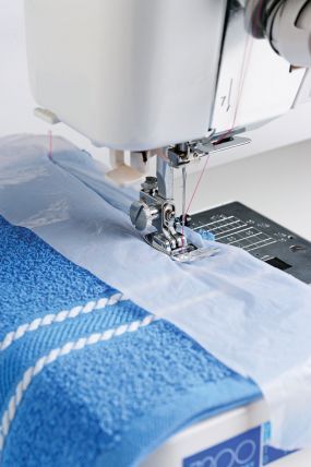 Use recycled bags for sewing tricky fabrics.