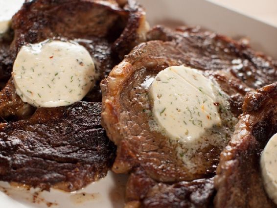 Cowboy/Hotel Butter on Steak. I grilled my steaks with salt and pepper. 3/4 cup softened, salted butter. Half a clove of garlic finely minced. A handful of parsley finely minced. A squirch of lemon juice. A dash of red pepper and a touch of black pepper..