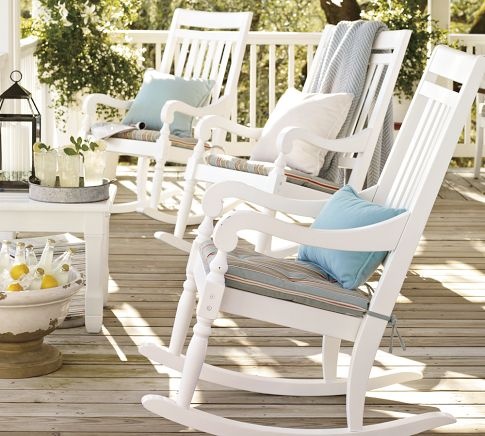 white rocking chairs on the porch