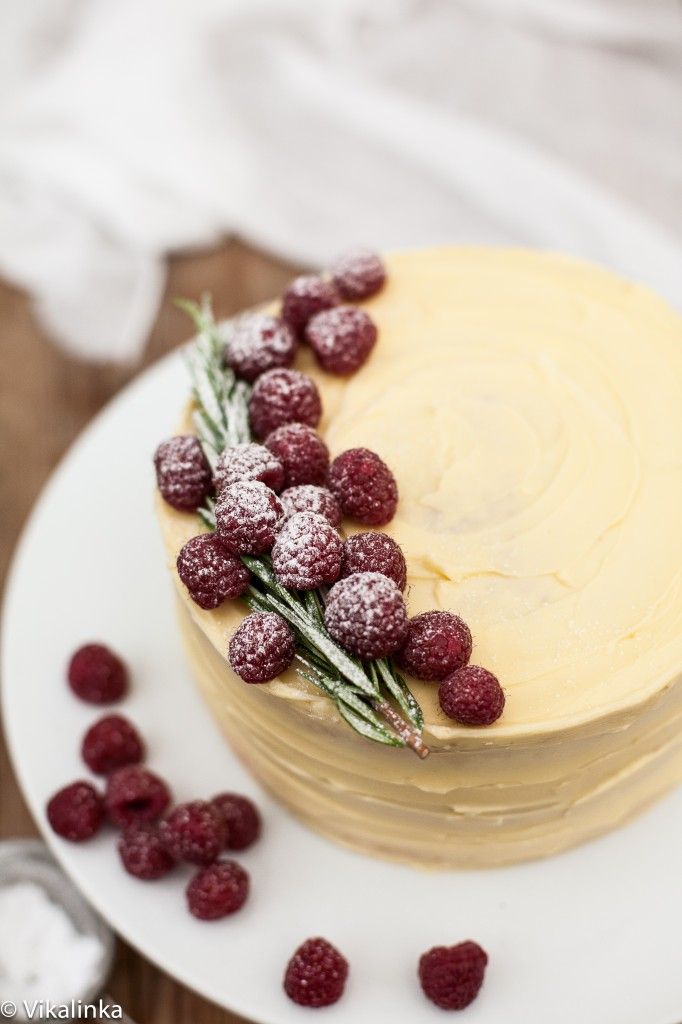 Delicate vanilla cake layers filled with mascarpone cream and raspberry compote and covered with white chocolate buttercream. A dream come true!