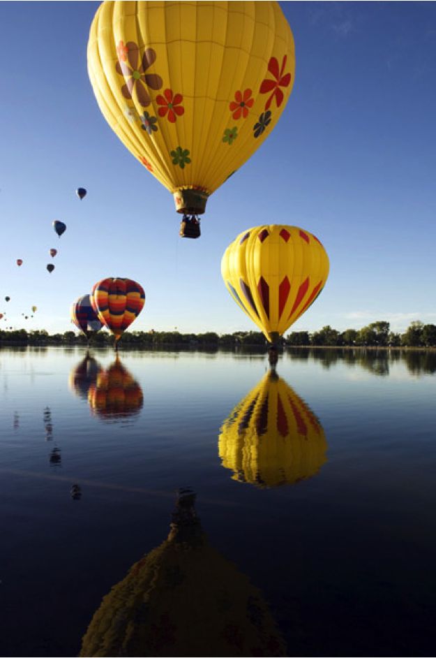 Time to drift off into the sky and watch the entire world shrink before your eyes on Cheyenne Hot Air Balloon ride! #HotAirBalloon