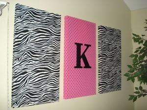 Super cute, fabric around canvas :) for my daughters room