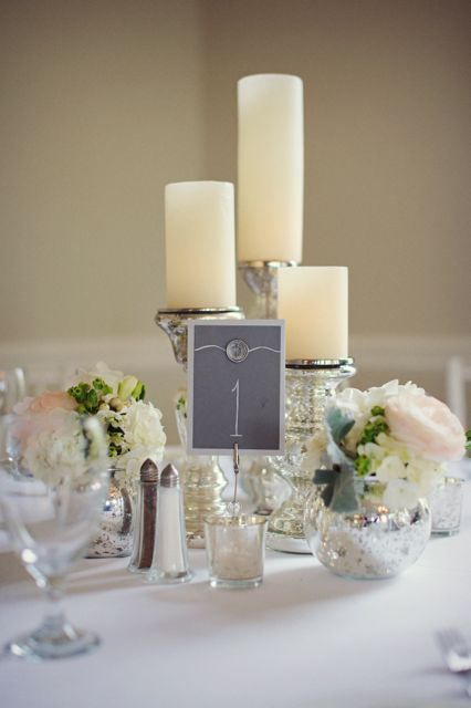 Centerpiece of mercury glass with peonies and garden roses | Kensey + John | Haig Point Wedding | #HiltonHead #DestinationWedding
