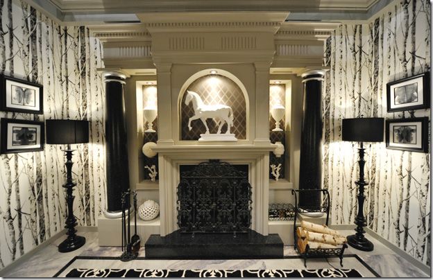 I love all of the forest wallpaper on the ABC show "Once Upon a Time". The one in the evil queen's home is especially stunning. It's Sandpiper from Eco Chic! Get it at Seabrook for $52 a roll