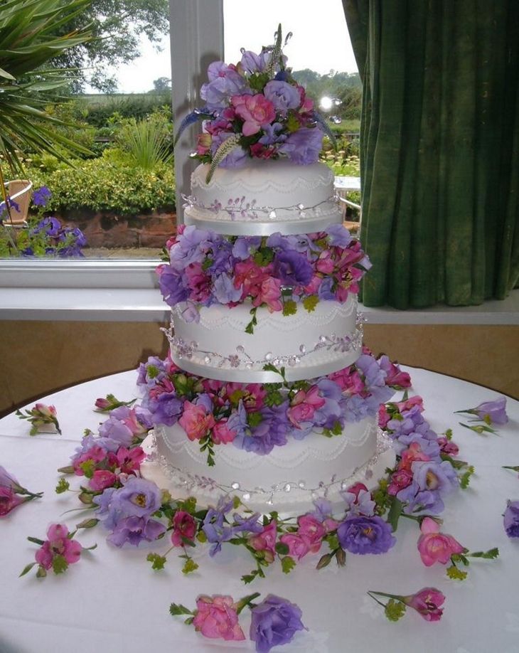 wedding cakes | Three tier wedding cake and flowers. (Wedding Cakes)