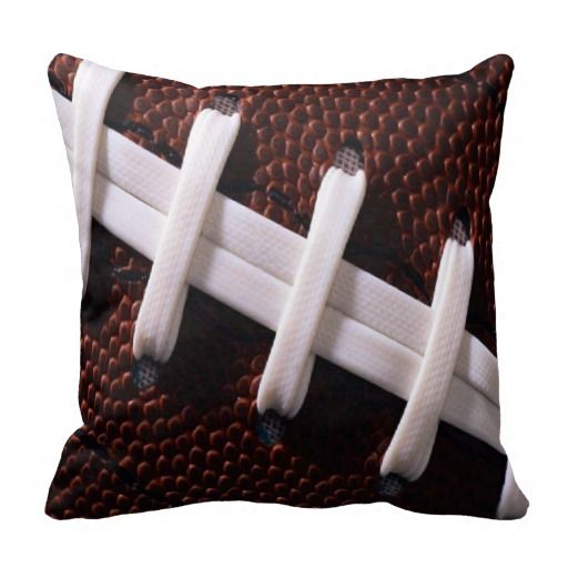 This fun throw pillow looks like it has been encased by a football! football, pigskin, sports, brown and white, bedroom, home decor $29