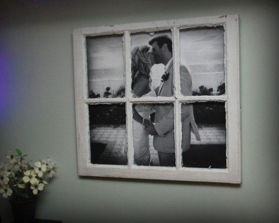 Large photo in an old window pane - the link is just a picture - but it could still possibly end up stunning. Now to frequent a flea sale for a window pane...
