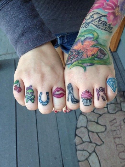 Girly knuckle tattoos by Travis Brown #InkedMagazine #knuckle #tattoos #tattoo #inked #girls #cherries #skull #horseshoe #lips #heel #cupcake #13 #diamond #girly #ink