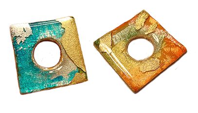 How to make faux dichroic glass with polymer clay, leaf & ink. (Spanish) I opened it in Google Chrome so I could get the English Translation.
