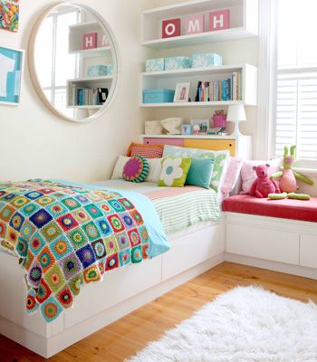 Love the white with bright colours and shelves - fantastic for a girl's room. From Australian Home & Garden.