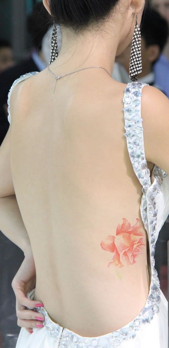 Beautiful Rose Tattoo the water paint/ watercolour effect looks stunning, although this does look fake or maybe a tattoo concept, either way it still looks pretty. Delicate, exotic and gorgeous!