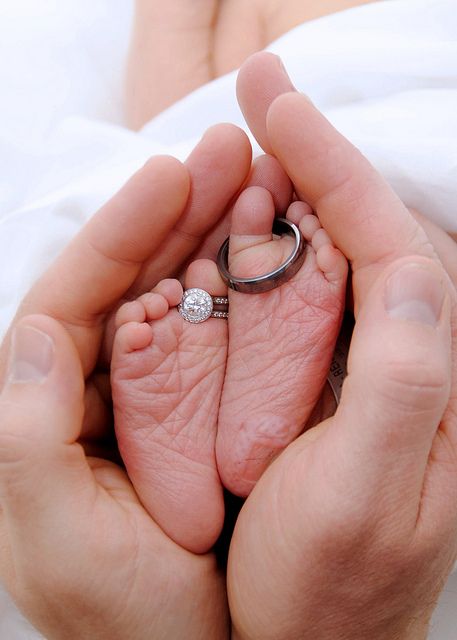Cute!  Wedding rings on baby toes