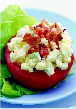 Crispy Bacon 'n Egg Salad – Who needs sandwich bread? This creamy, crunchy egg salad is served on halved tomatoes and sprinkled with bacon.