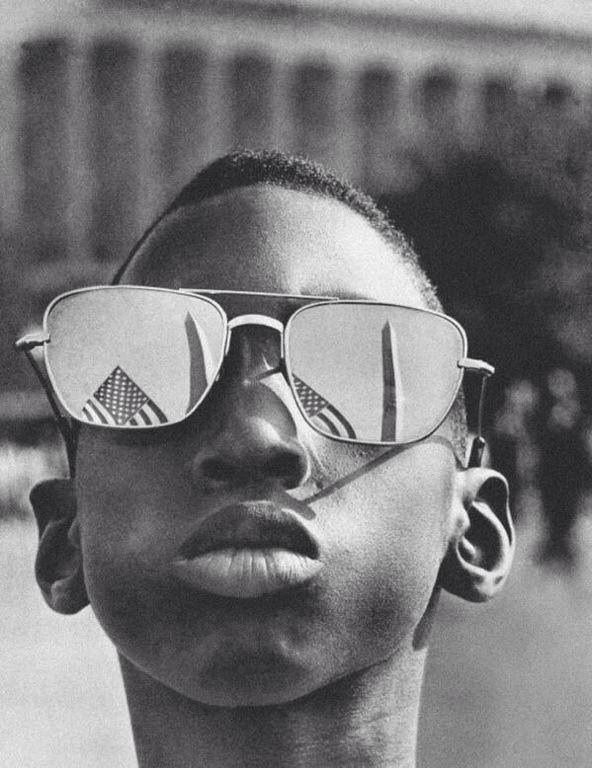A boy attending Martin Luther King’s speech, 1968
