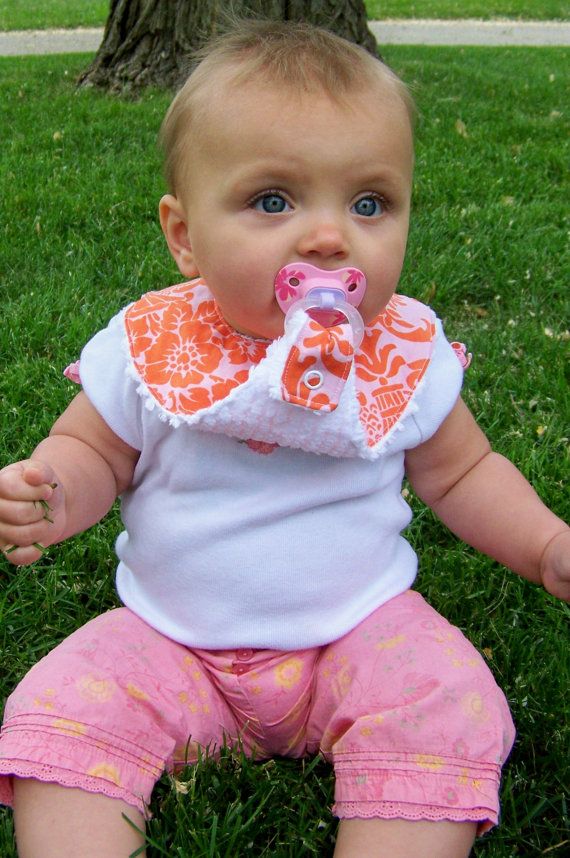 Pacifier bib, better than the clips and catches the drool