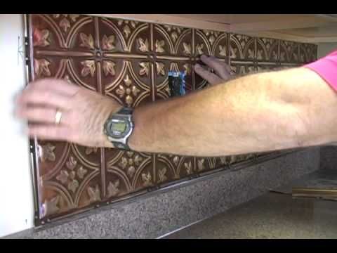 The American Tin Ceiling Company shows the simplicity of installing a tin backsplash for under your cabinets. This tutorial shows the best techniques for turning a boring kitchen into a beautiful place to show off. Easily installed with Liquid Nails, the 