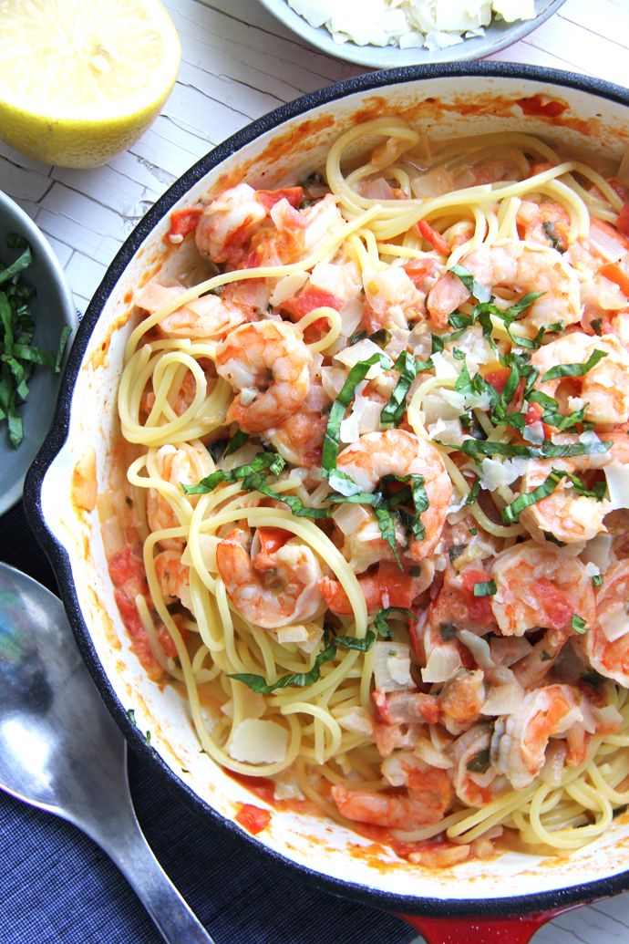 Creamy Tomato & Basil Shrimp Pasta — The sauce, it's so delicious. You just can't go wrong with the combination of basil, tomatoes, garlic, wine, and cream all tossed with shrimp and spaghetti noodles. #recip