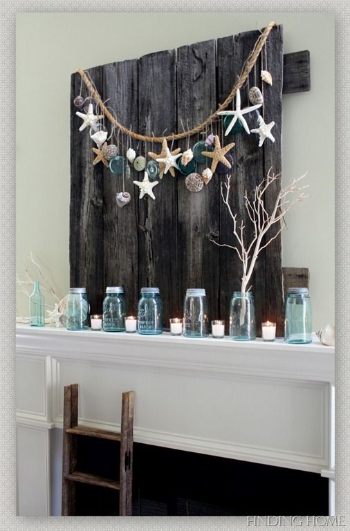 i love how the dried sea creatures were put together and how they used the dark wooden planks as background  ~Anny