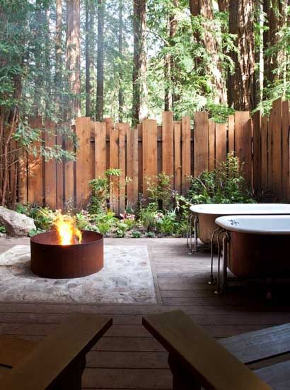 This picture was taken at Big Sur Cabin in California. I love the fence and the outdoor bathtubs. How relaxing is this under the trees near the beach...Glen Oaks Big Sur