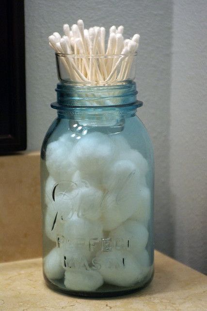 ason jar and a votive holder